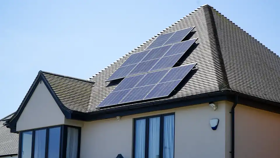 A house with solar panels on its roof